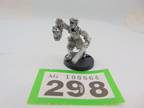 Steel Legion Sergeant with Chainsword & Ork Head