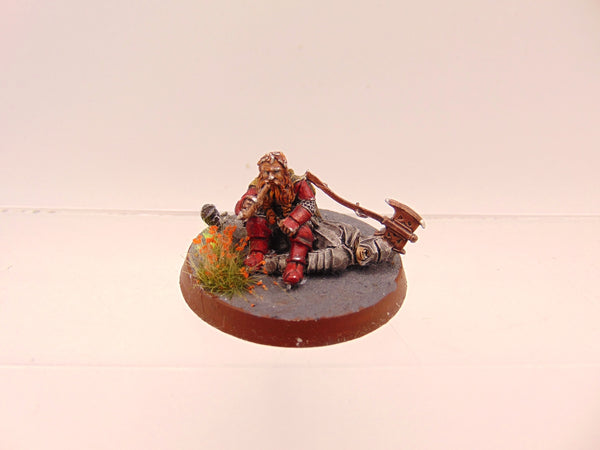 Gimli on Dead Uruk Hai