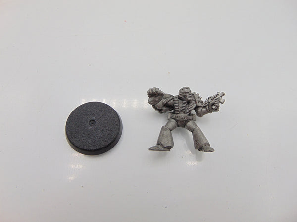 Space Marine with powerglove and bolt pistol